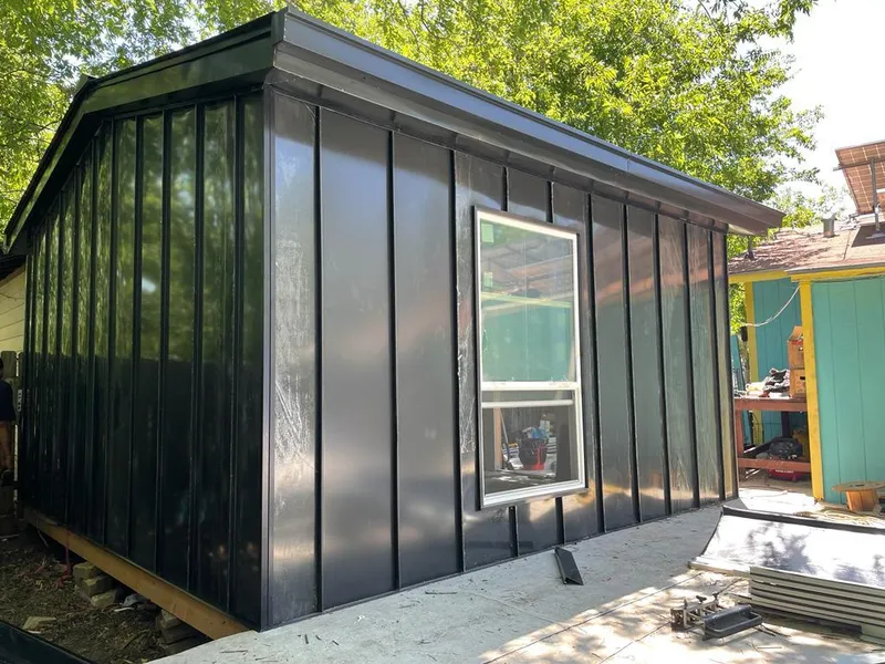 Black standing seam metal wall panels for Metal Roof Installation in East Allen