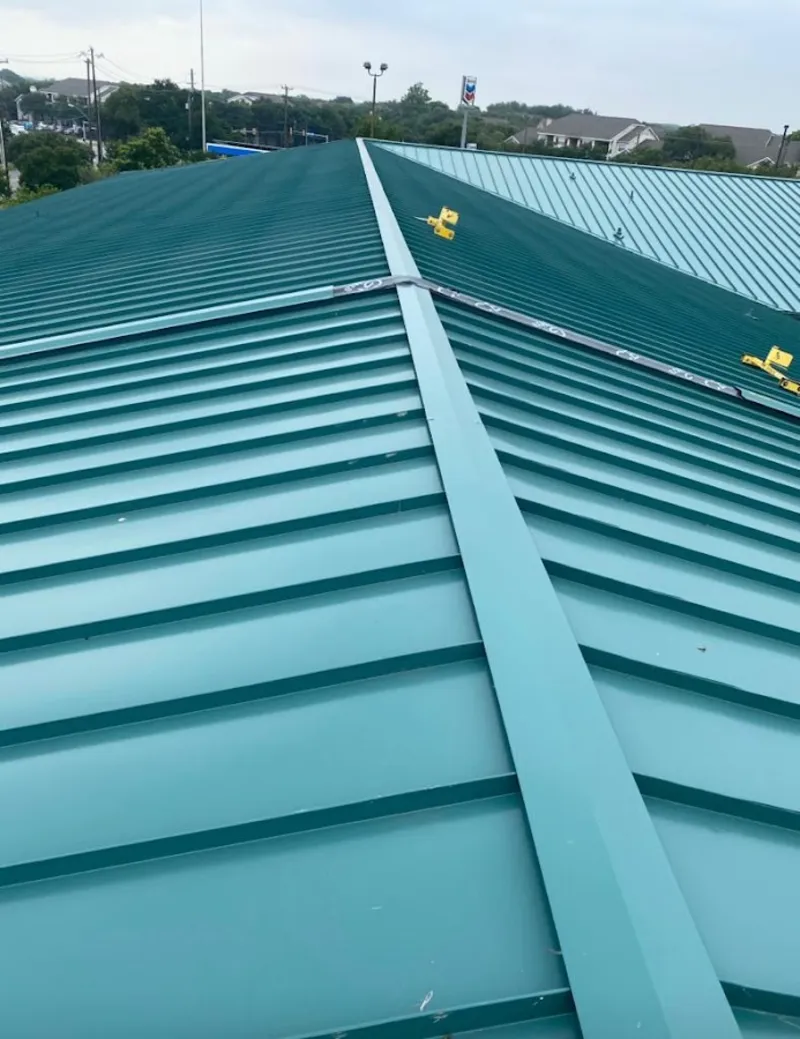 Green commercial metal roof ridge and valley for Metal Roof Repair in East Allen