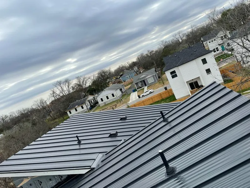 Standing seam metal roof panels with vents for Skylight Repair in East Allen